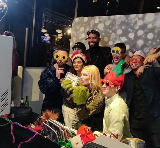 Photo Booth at a corporate party where people wear hilarious props